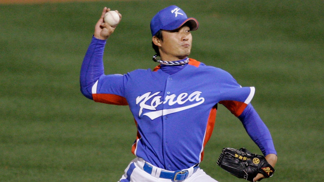 Cardinals sign Korean RHP Oh to set up Rosenthal